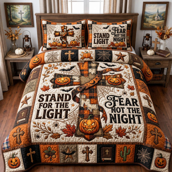Pumpkin Cross Faith quilted 3-piece bedding set on a made bed against a dark styled interior