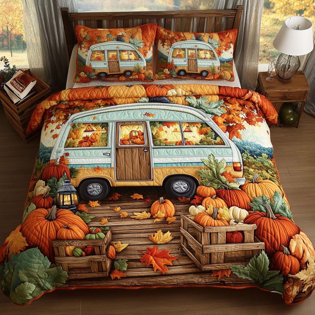 Pumpkin Patch Camper quilted 3-piece bedding set on a made bed against a dark styled interior