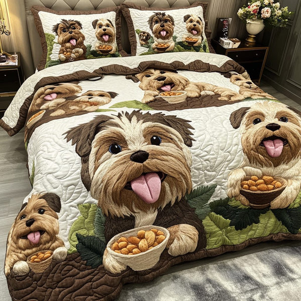 Puppy Dreams quilted 3-piece bedding set on a made bed with two matching pillow shams