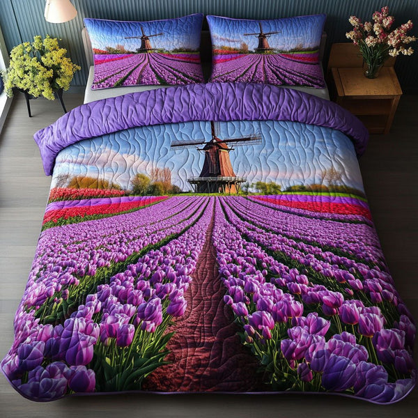 Purple Bloomscape quilted 3-piece bedding set on a made bed with two matching pillow shams