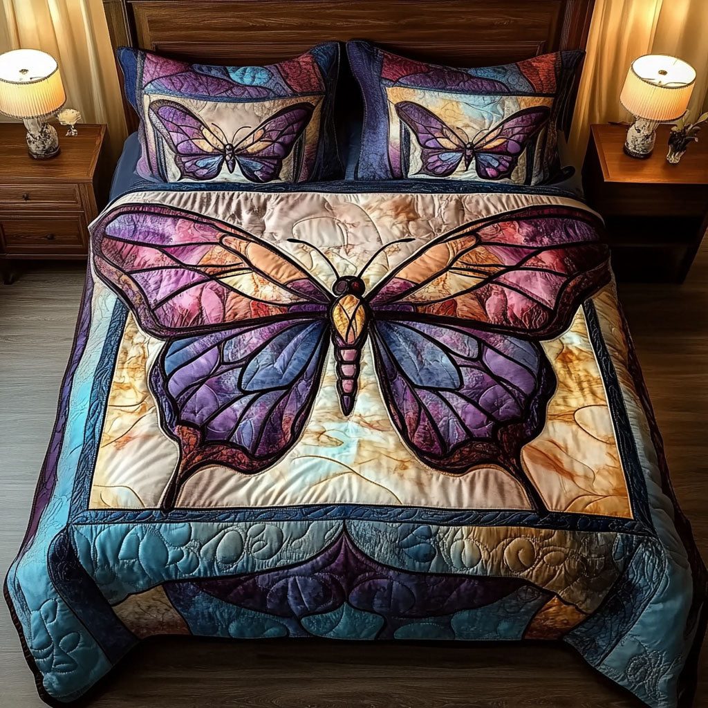 Purple Flight quilted 3-piece bedding set on a made bed with two matching pillow shams
