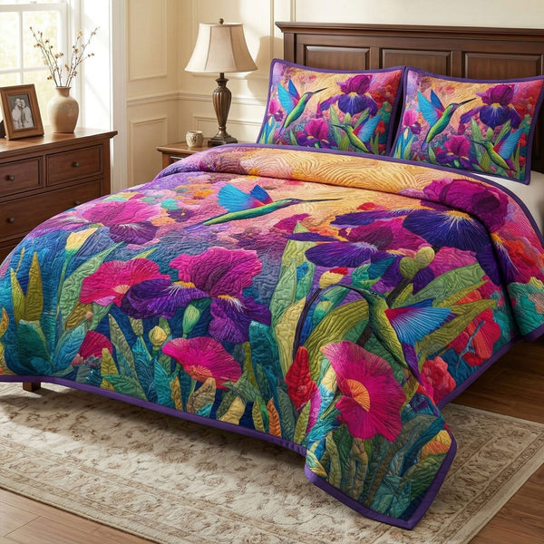 Purple Iris Flight quilted 3-piece bedding set on a made bed with two matching pillow shams