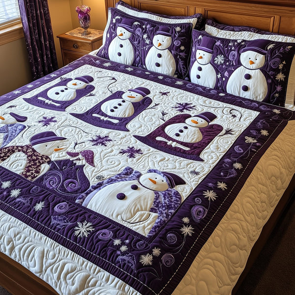 Purple Joy quilted 3-piece bedding set on a made bed with two matching pillow shams