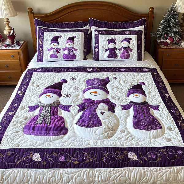Purple Joy quilted 3-piece bedding set on a made bed with two matching pillow shams