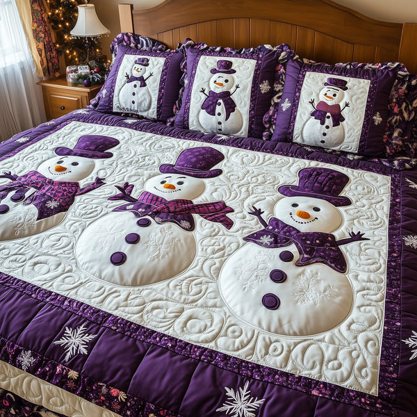 Purple Joy quilted 3-piece bedding set on a made bed with two matching pillow shams