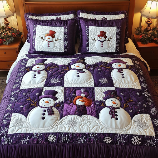 Purple Joy quilted 3-piece bedding set on a made bed with two matching pillow shams