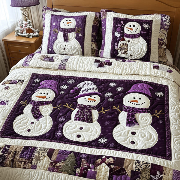 Purple Joy quilted 3-piece bedding set on a made bed with two matching pillow shams