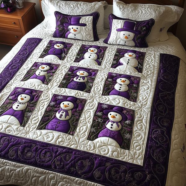 Purple Joy quilted 3-piece bedding set on a made bed with two matching pillow shams