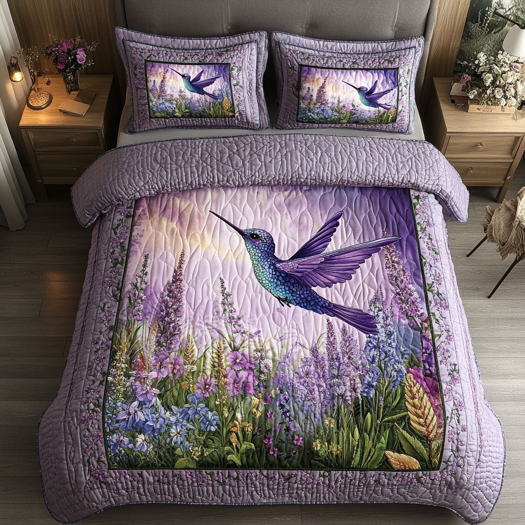 Purple Sunset Bird quilted 3-piece bedding set on a made bed with two matching pillow shams