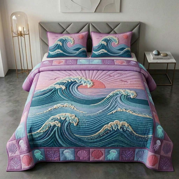 Purple Sunset quilted 3-piece bedding set on a made bed with two matching pillow shams