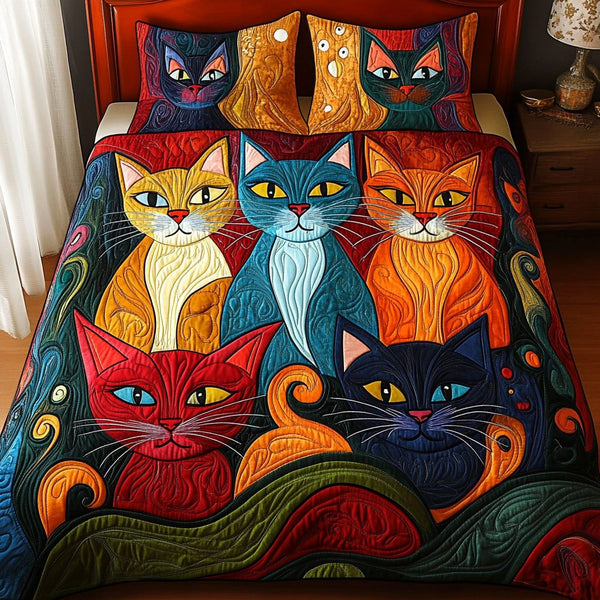 Purr Haven quilted 3-piece bedding set on a made bed with two matching pillow shams