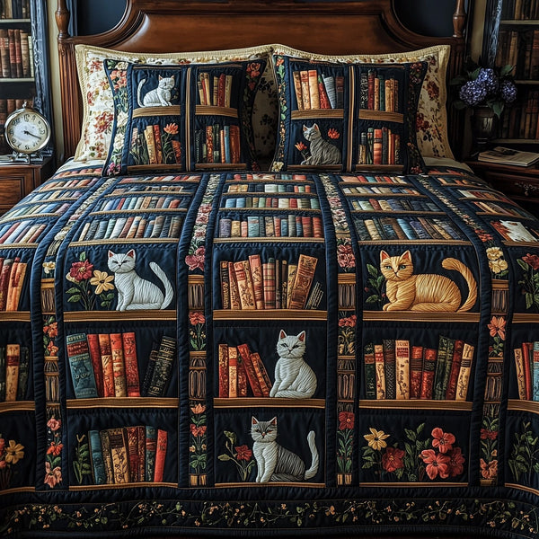 Purrfect Library Retreat quilted 3-piece bedding set on a made bed with two matching pillow shams
