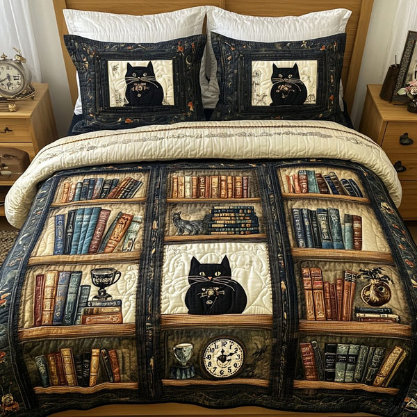 Purrfect Reads quilted 3-piece bedding set on a made bed with two matching pillow shams