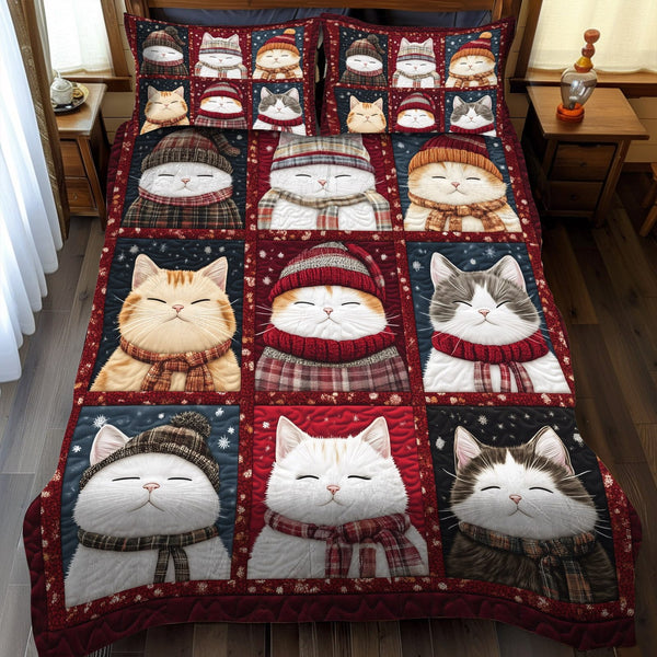 Purrfectly Cozy Cats quilted 3-piece bedding set on a made bed with two matching pillow shams