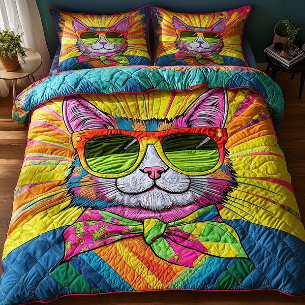 Purring Charm quilted 3-piece bedding set on a made bed with two matching pillow shams