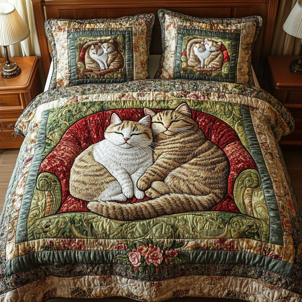 Purring Companions quilted 3-piece bedding set on a made bed with two matching pillow shams