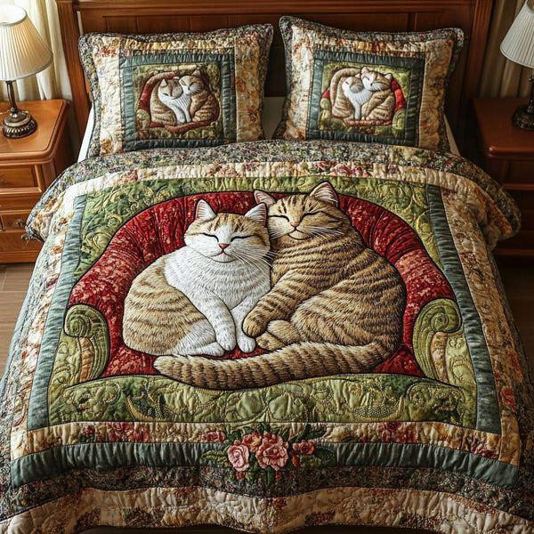 Purring Companions quilted 3-piece bedding set on a made bed with two matching pillow shams