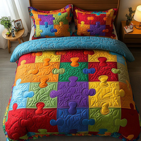 Puzzle Garden quilted 3-piece bedding set on a made bed with two matching pillow shams