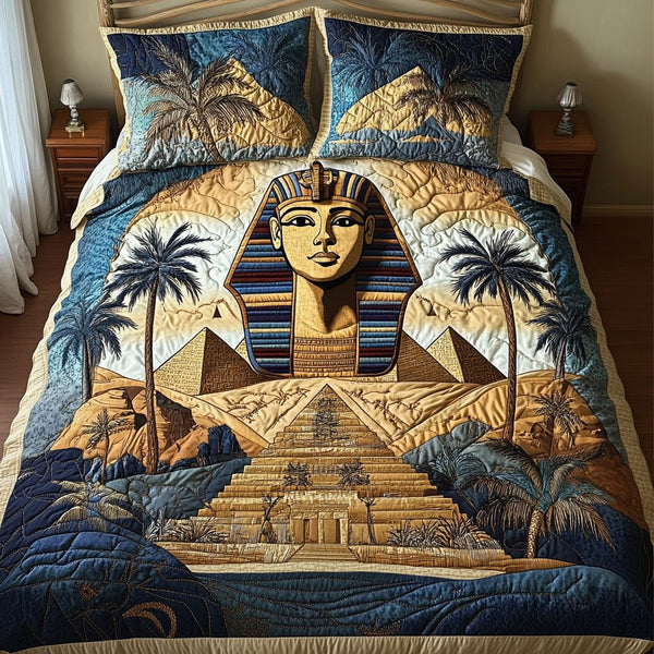 Pyramid Majesty quilted 3-piece bedding set on a made bed with two matching pillow shams