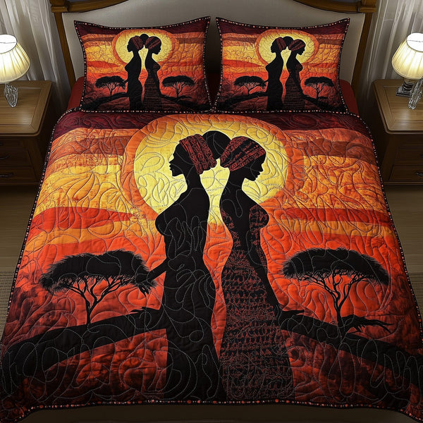 Queens of the Savanna quilted 3-piece bedding set on a made bed with two matching pillow shams