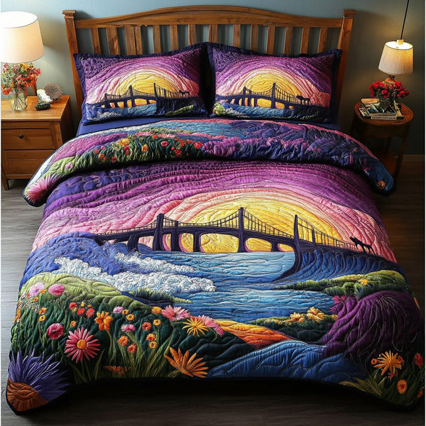 Quiet Meadow quilted 3-piece bedding set on a made bed with two matching pillow shams