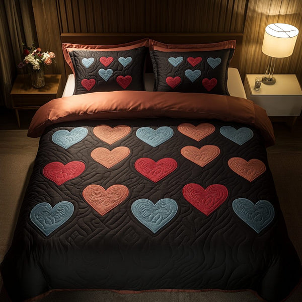 Quilted Affection quilted 3-piece bedding set on a made bed with two matching pillow shams