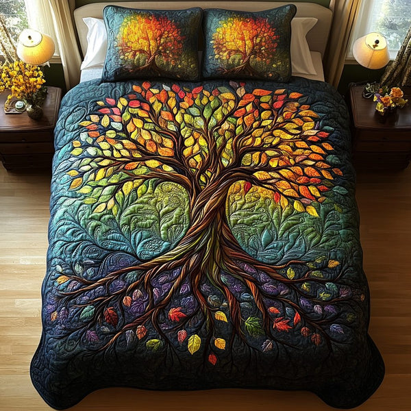 Radiant Arbor quilted 3-piece bedding set on a made bed with two matching pillow shams