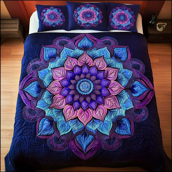 Radiant Bloom quilted 3-piece bedding set on a made bed with two matching pillow shams