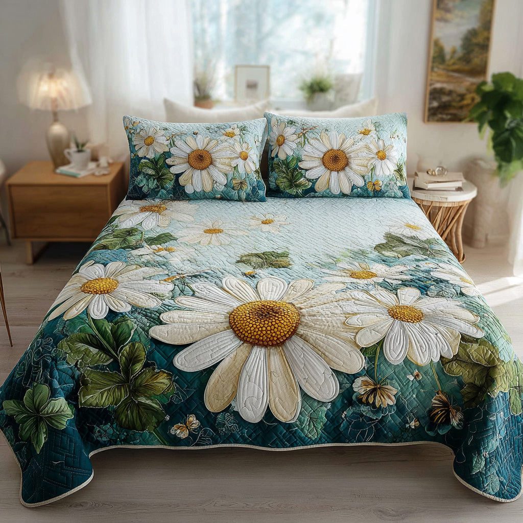Radiant Bloom quilted 3-piece bedding set on a made bed with two matching pillow shams