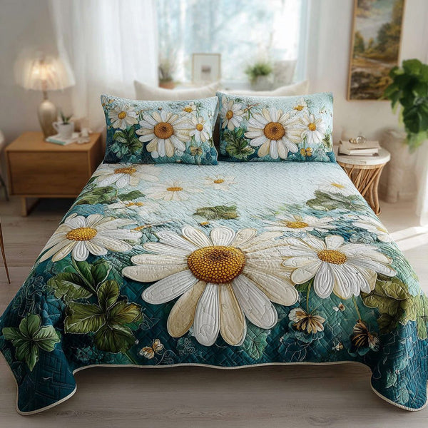 Radiant Bloom quilted 3-piece bedding set on a made bed with two matching pillow shams