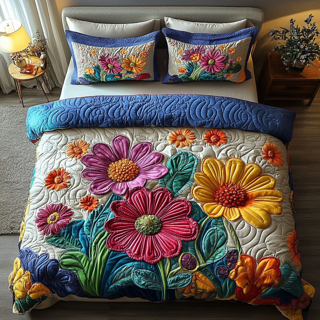 Radiant Blooms quilted 3-piece bedding set on a made bed with two matching pillow shams