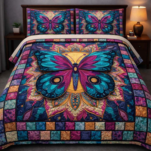 Radiant Butterfly Mosaic quilted 3-piece bedding set on a made bed with two matching pillow shams