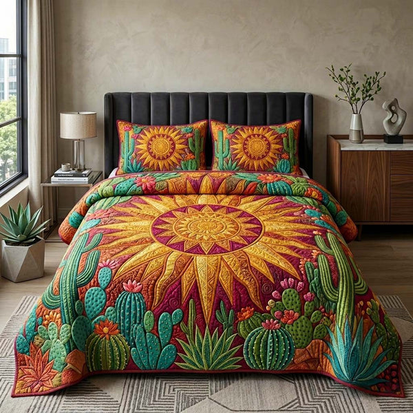 Radiant Cactus quilted 3-piece bedding set on a made bed with two matching pillow shams