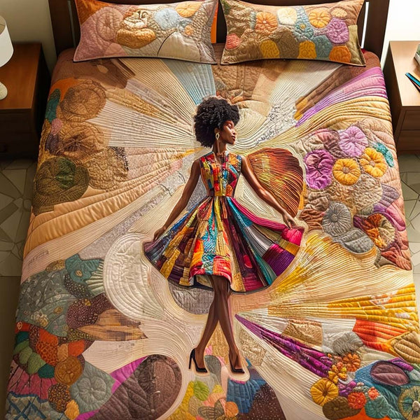 Radiant Dancer quilted 3-piece bedding set on a made bed with two matching pillow shams