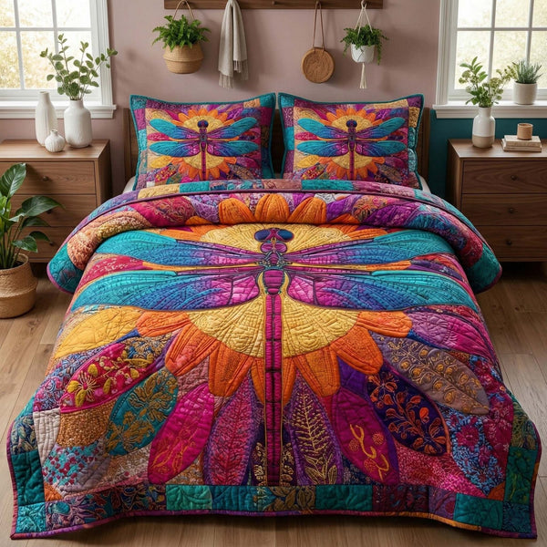 Radiant Dragonfly quilted 3-piece bedding set on a made bed with two matching pillow shams