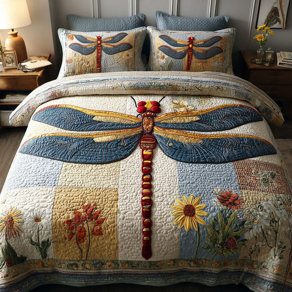 Radiant Dragonfly quilted 3-piece bedding set on a made bed with two matching pillow shams