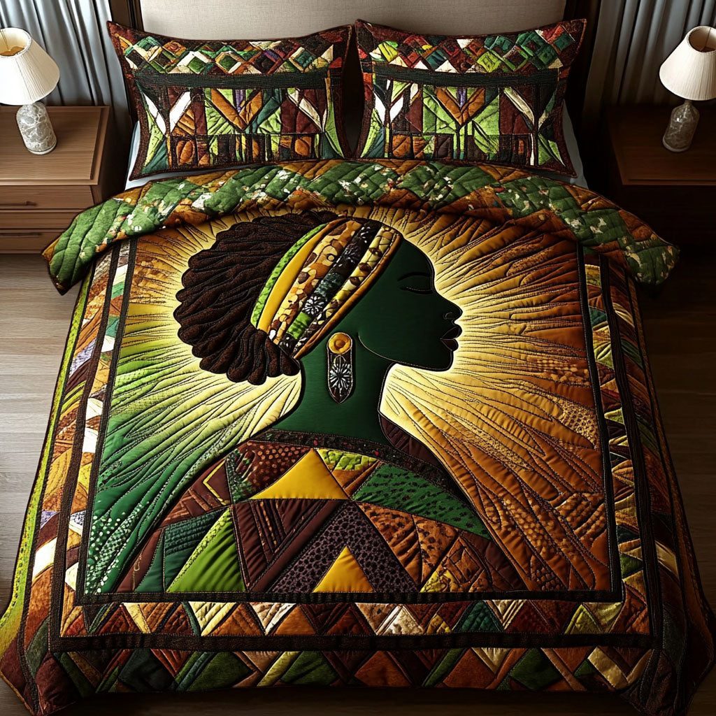 Radiant Essence quilted 3-piece bedding set on a made bed with two matching pillow shams