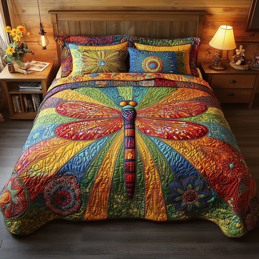 Radiant Flight Ensemble quilted 3-piece bedding set on a made bed with two matching pillow shams