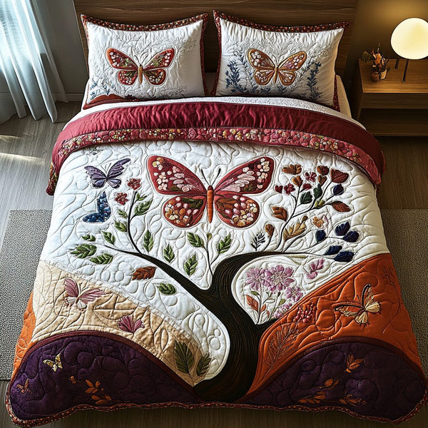 Radiant Flight quilted 3-piece bedding set on a made bed with two matching pillow shams