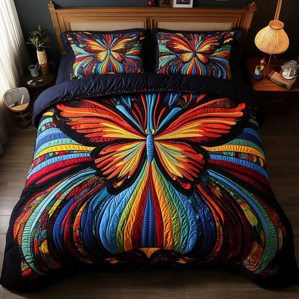 Radiant Flight quilted 3-piece bedding set on a made bed with two matching pillow shams
