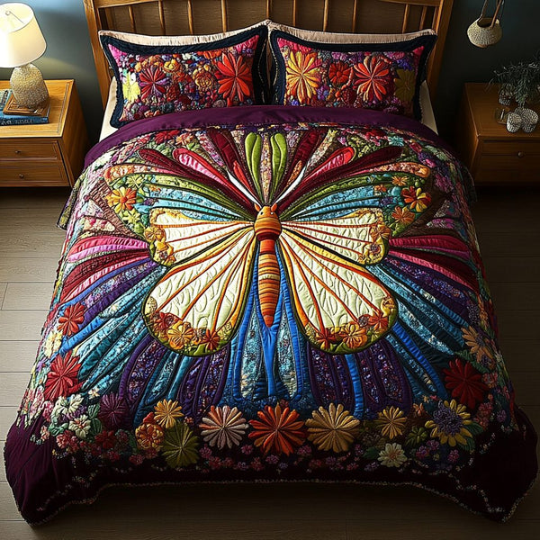 Radiant Flight quilted 3-piece bedding set on a made bed with two matching pillow shams