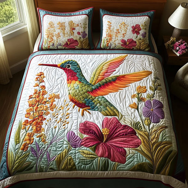 Radiant Flight quilted 3-piece bedding set on a made bed with two matching pillow shams