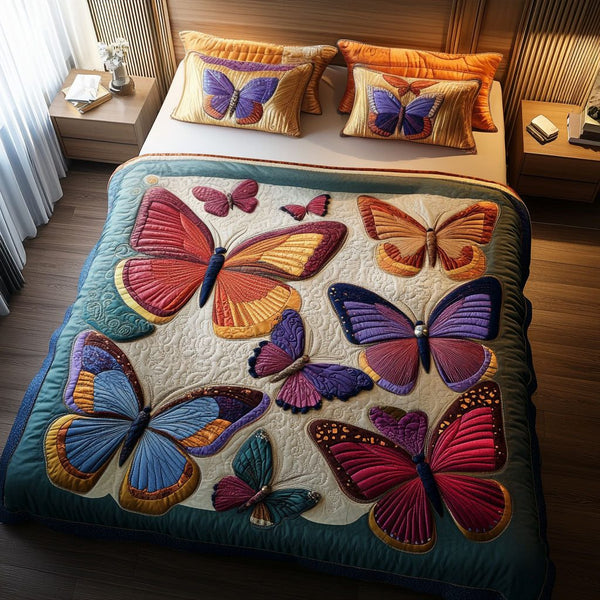 Radiant Flight quilted 3-piece bedding set on a made bed with two matching pillow shams
