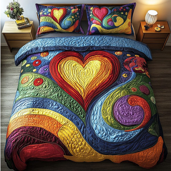 Radiant Heart quilted 3-piece bedding set on a made bed with two matching pillow shams
