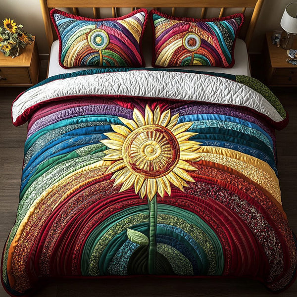 Radiant Meadow quilted 3-piece bedding set on a made bed with two matching pillow shams