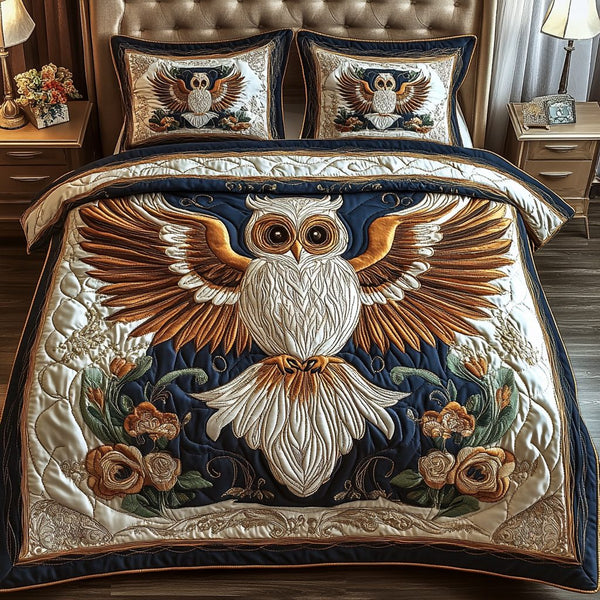 Radiant Owl quilted 3-piece bedding set on a made bed with two matching pillow shams
