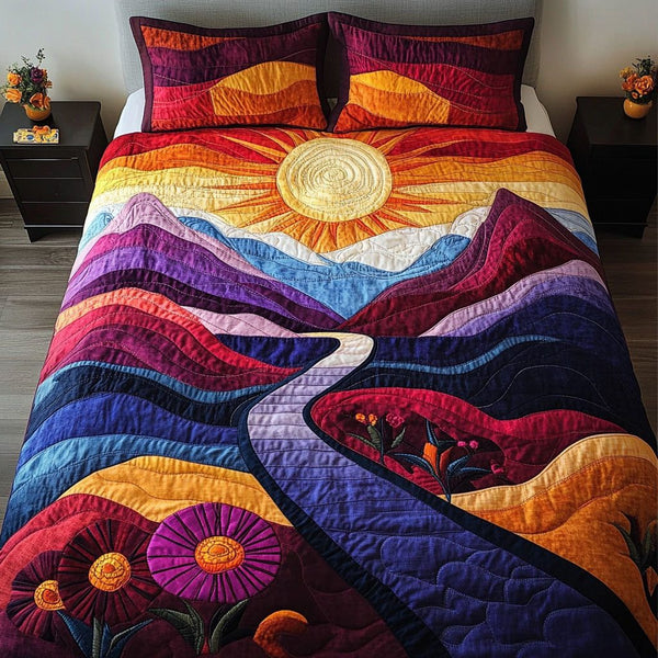 Radiant Peaks quilted 3-piece bedding set on a made bed with two matching pillow shams