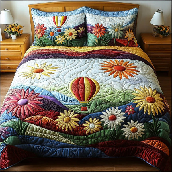 Radiant Rise quilted 3-piece bedding set on a made bed with two matching pillow shams