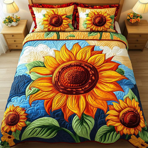 Radiant Sky quilted 3-piece bedding set on a made bed with two matching pillow shams