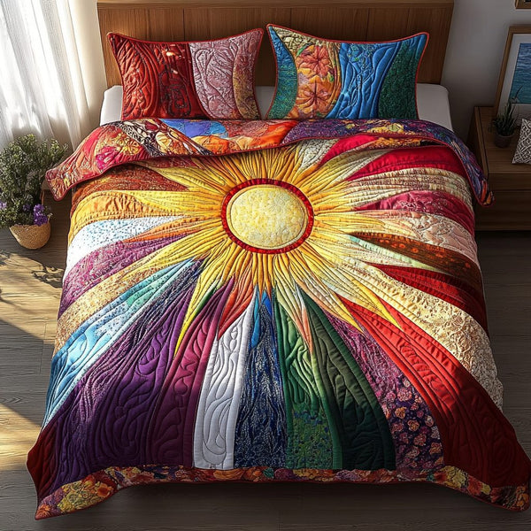 Radiant Sunrise quilted 3-piece bedding set on a made bed with two matching pillow shams